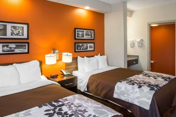 Premium bedding, pillowtop beds, desk, laptop workspace
