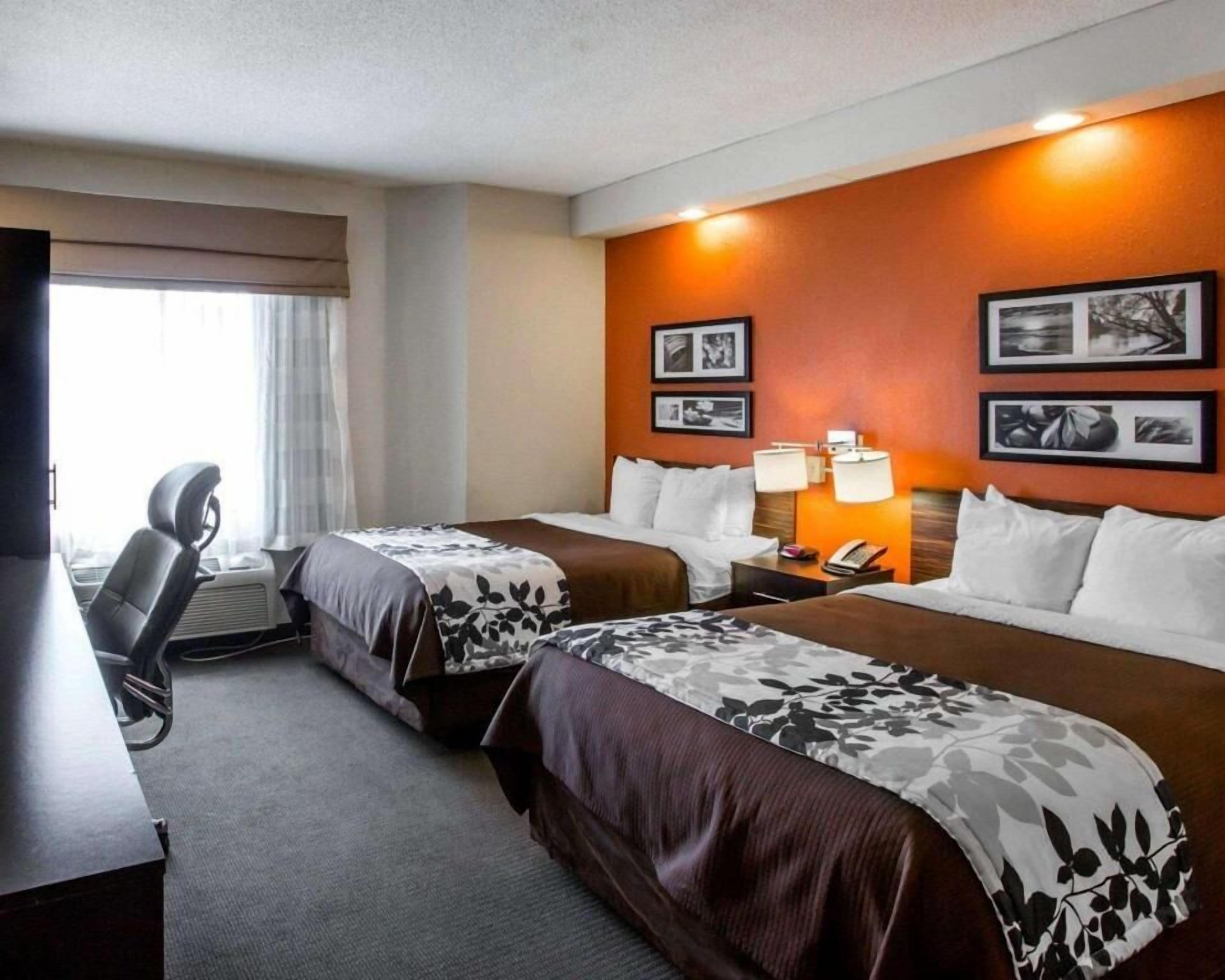 Premium bedding, pillowtop beds, desk, laptop workspace