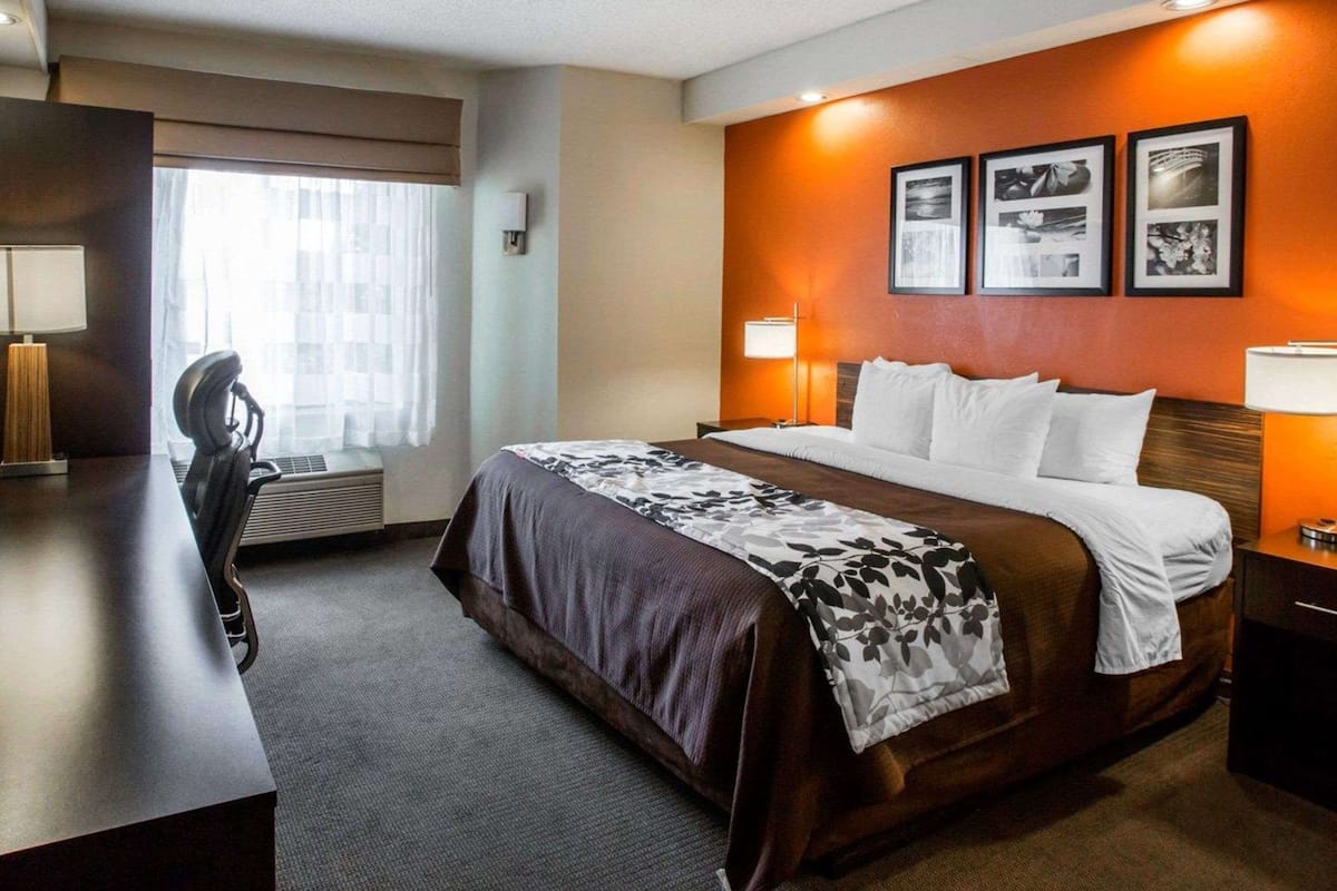 Premium bedding, pillow-top beds, desk, laptop workspace