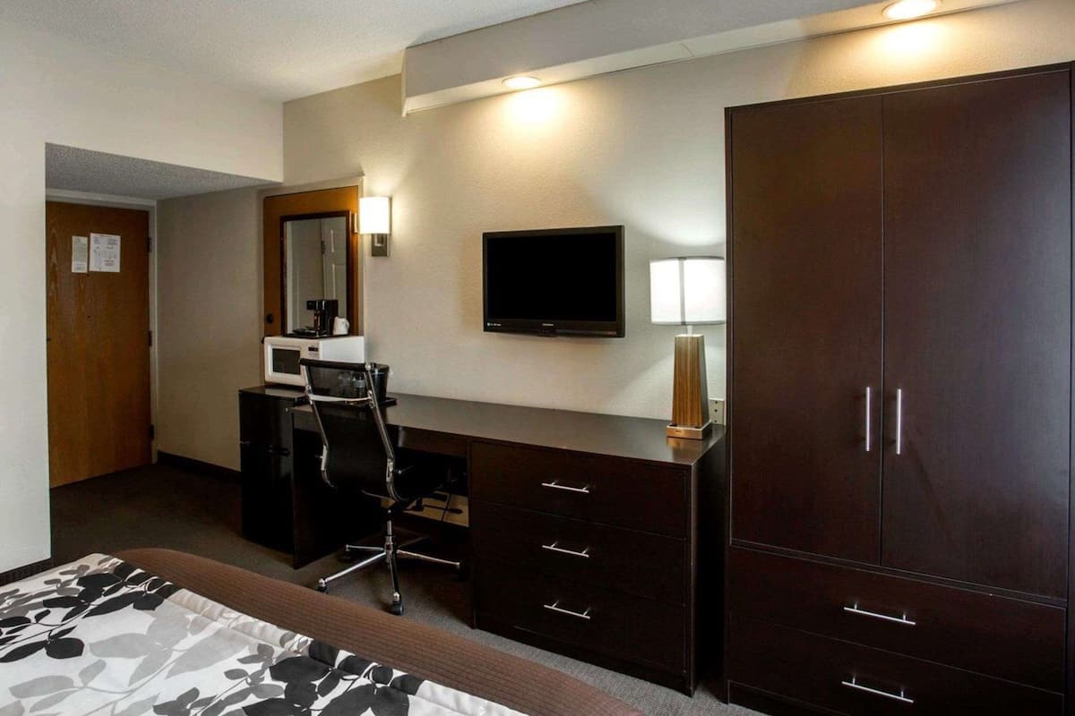 Premium bedding, pillow-top beds, desk, laptop workspace