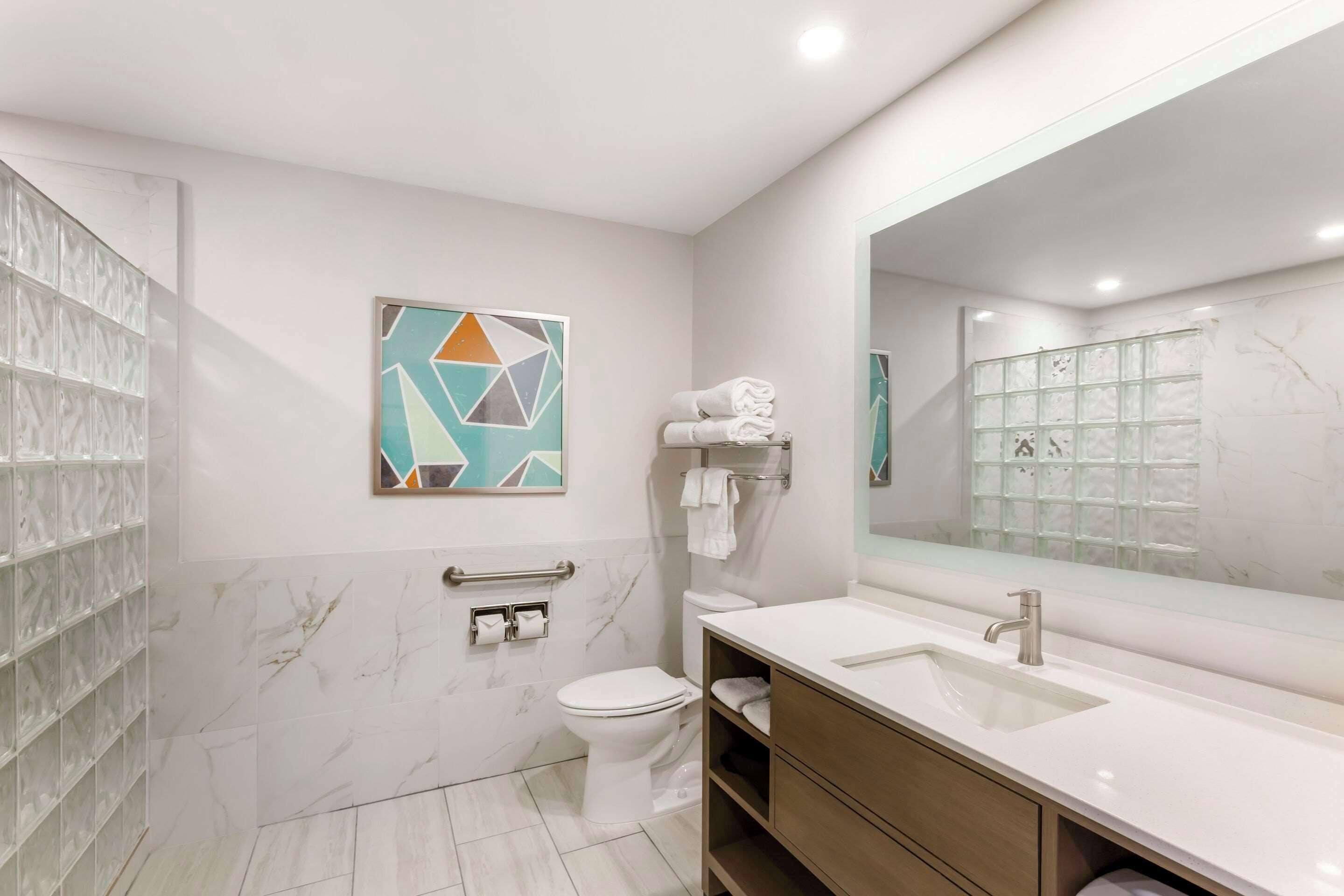 premium bedding, desk, laptop workspace, blackout curtains