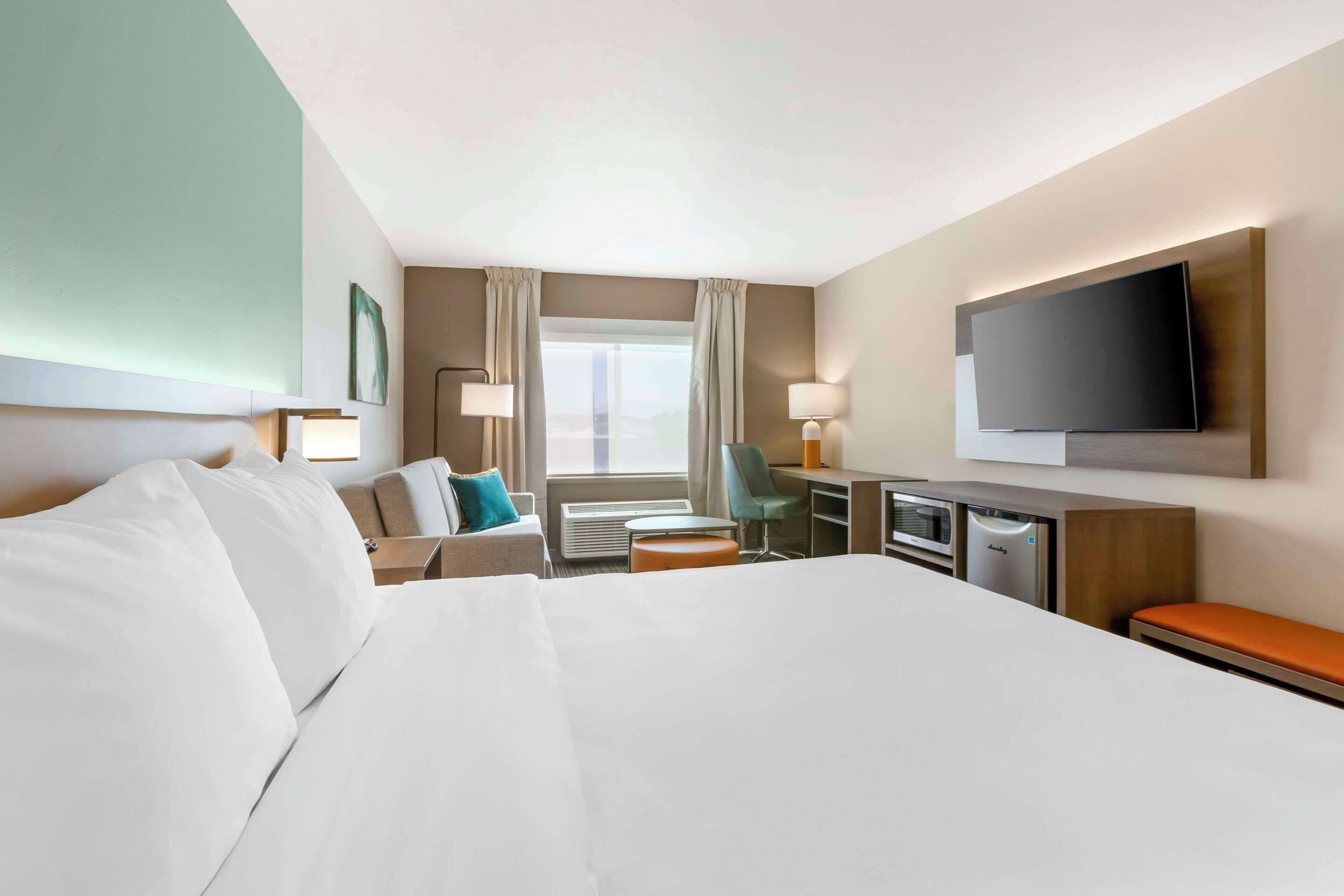 suite, 1 king bed with sofa bed, non smoking | premium bedding, desk, laptop workspace, blackout curtains