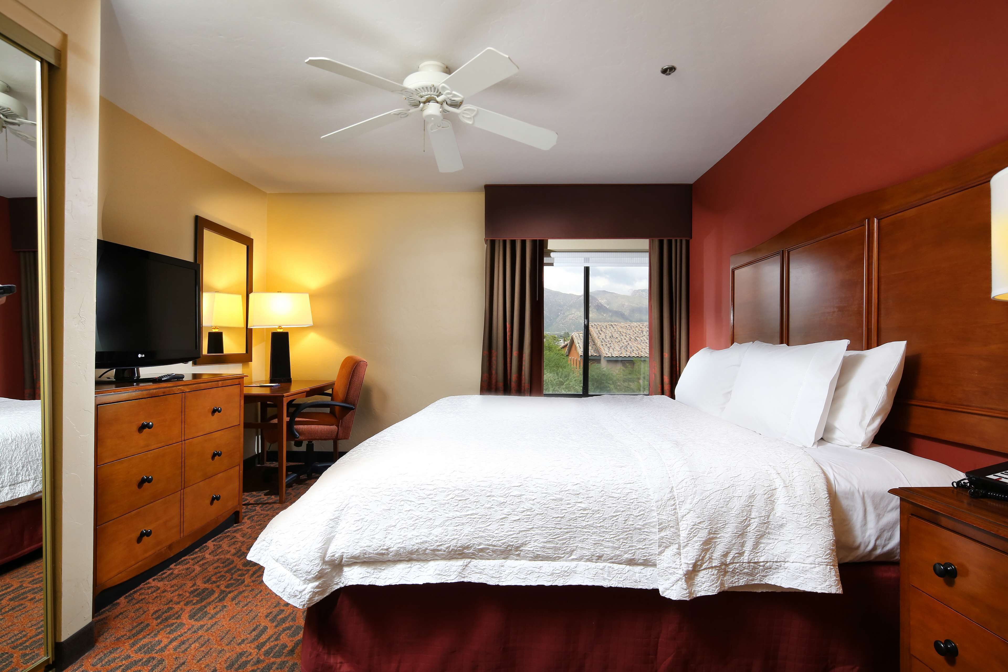 premium bedding, pillow-top beds, desk, laptop workspace