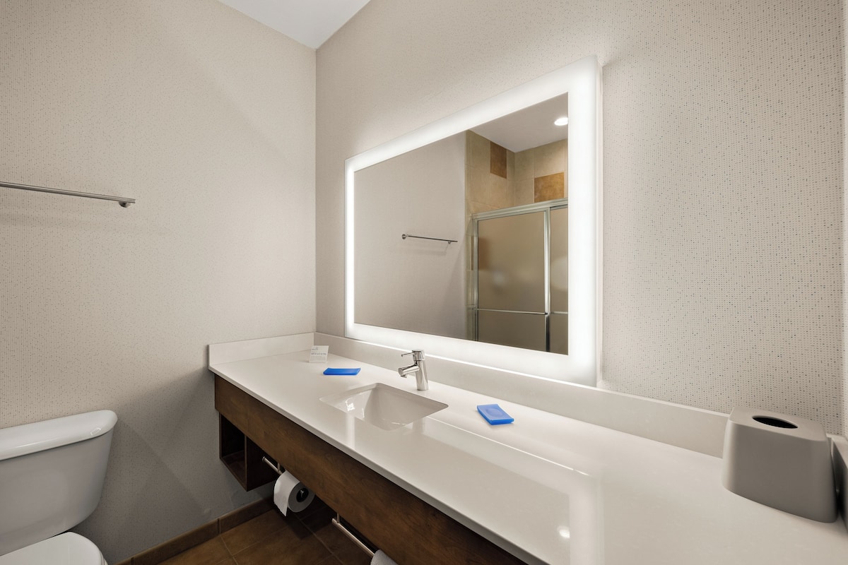 Designer toiletries, hair dryer, towels, soap