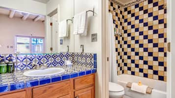Room, 1 King Bed, Patio (Pet Friendly) | Bathroom | Free toiletries, hair dryer, towels