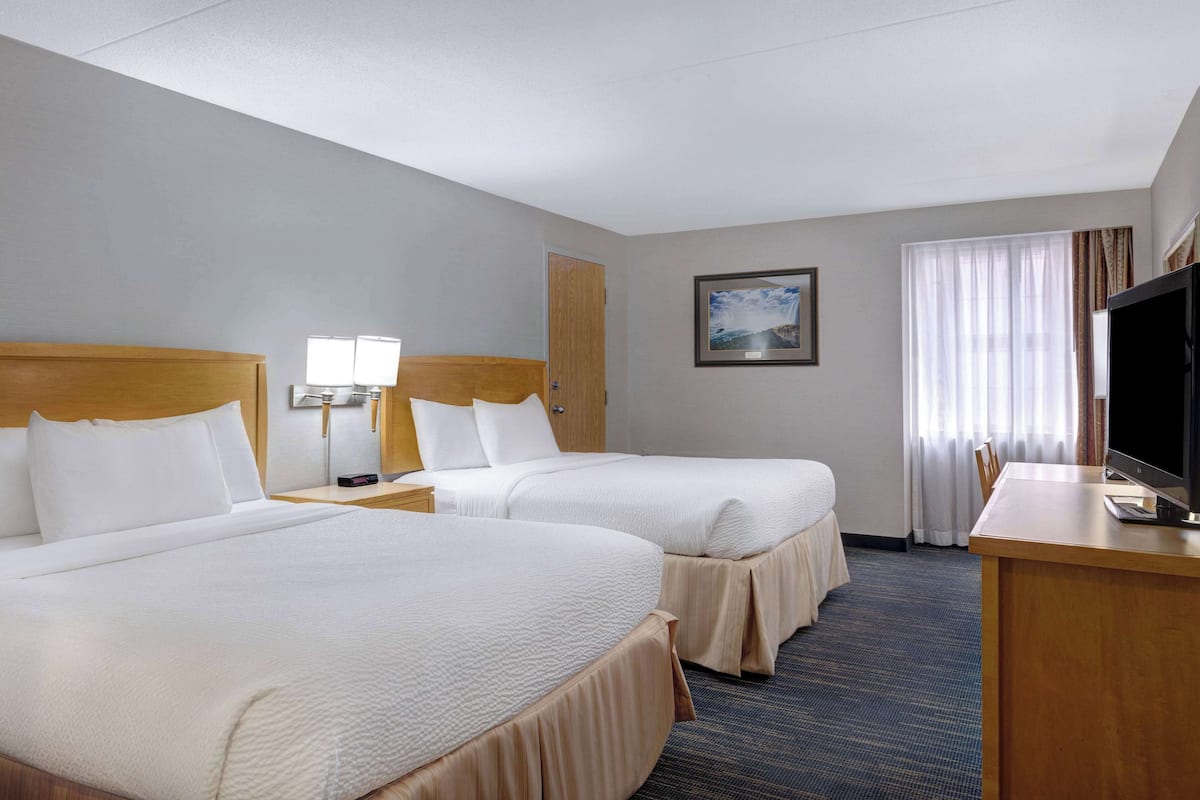 Standard Room, 2 Queen Beds, Non Smoking | Blackout curtains, free cots/infant beds, rollaway beds, free WiFi