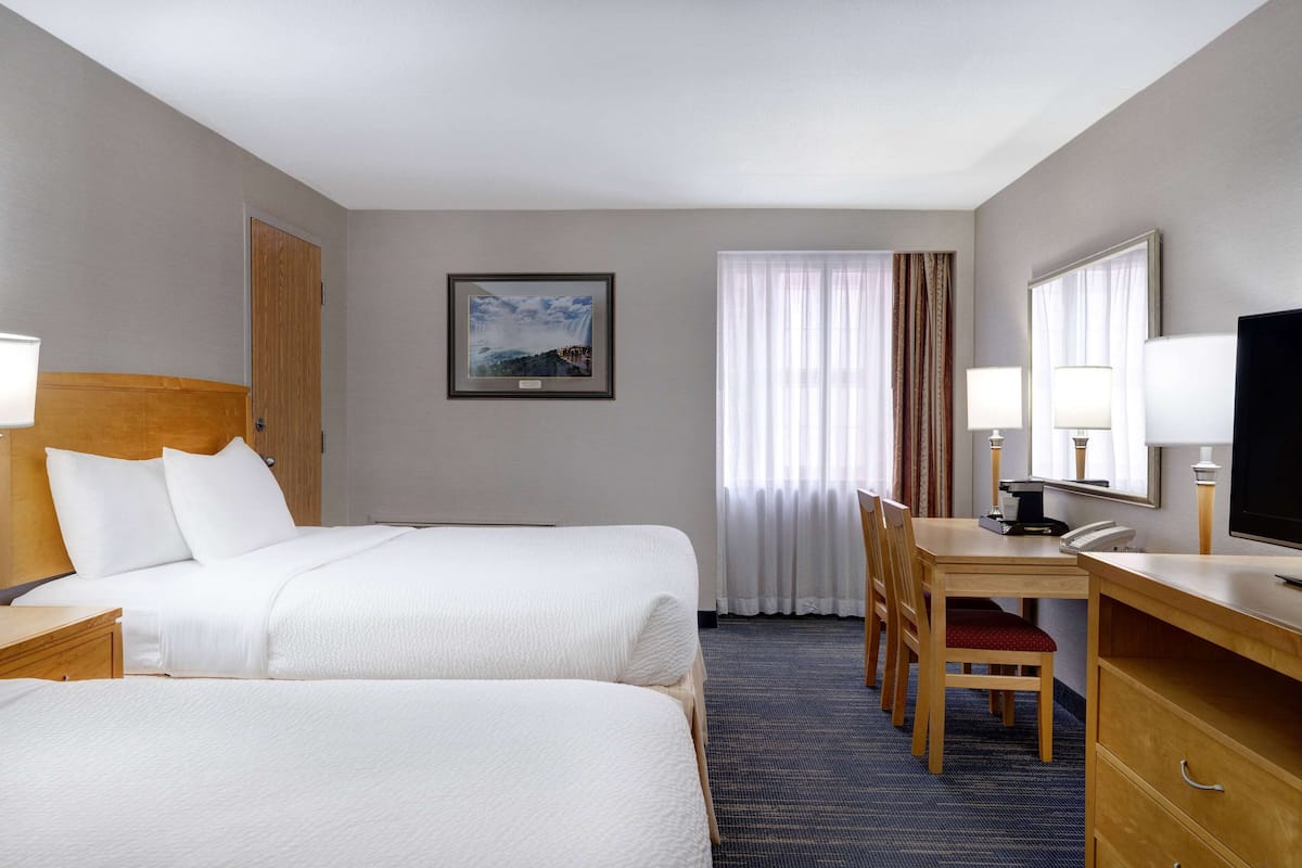 Blackout curtains, free cots/infant beds, rollaway beds, free WiFi