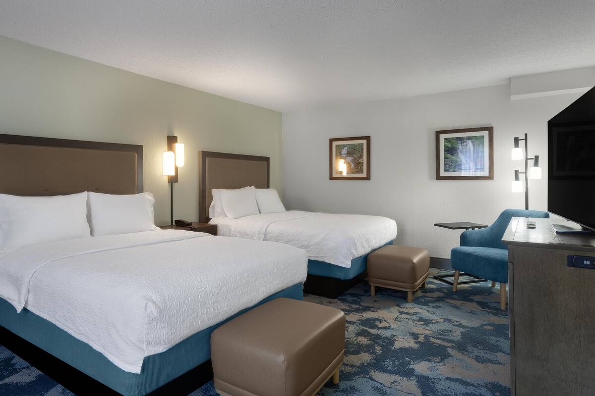 Two Queen Studio Room | Desk, iron/ironing board, free cribs/infant beds, free WiFi