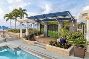 Outdoor pool, pool umbrellas, pool loungers