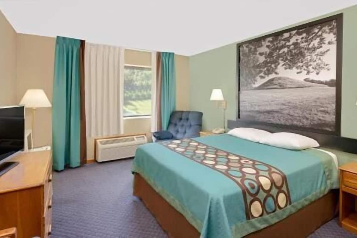 Desk, laptop workspace, blackout curtains, iron/ironing board