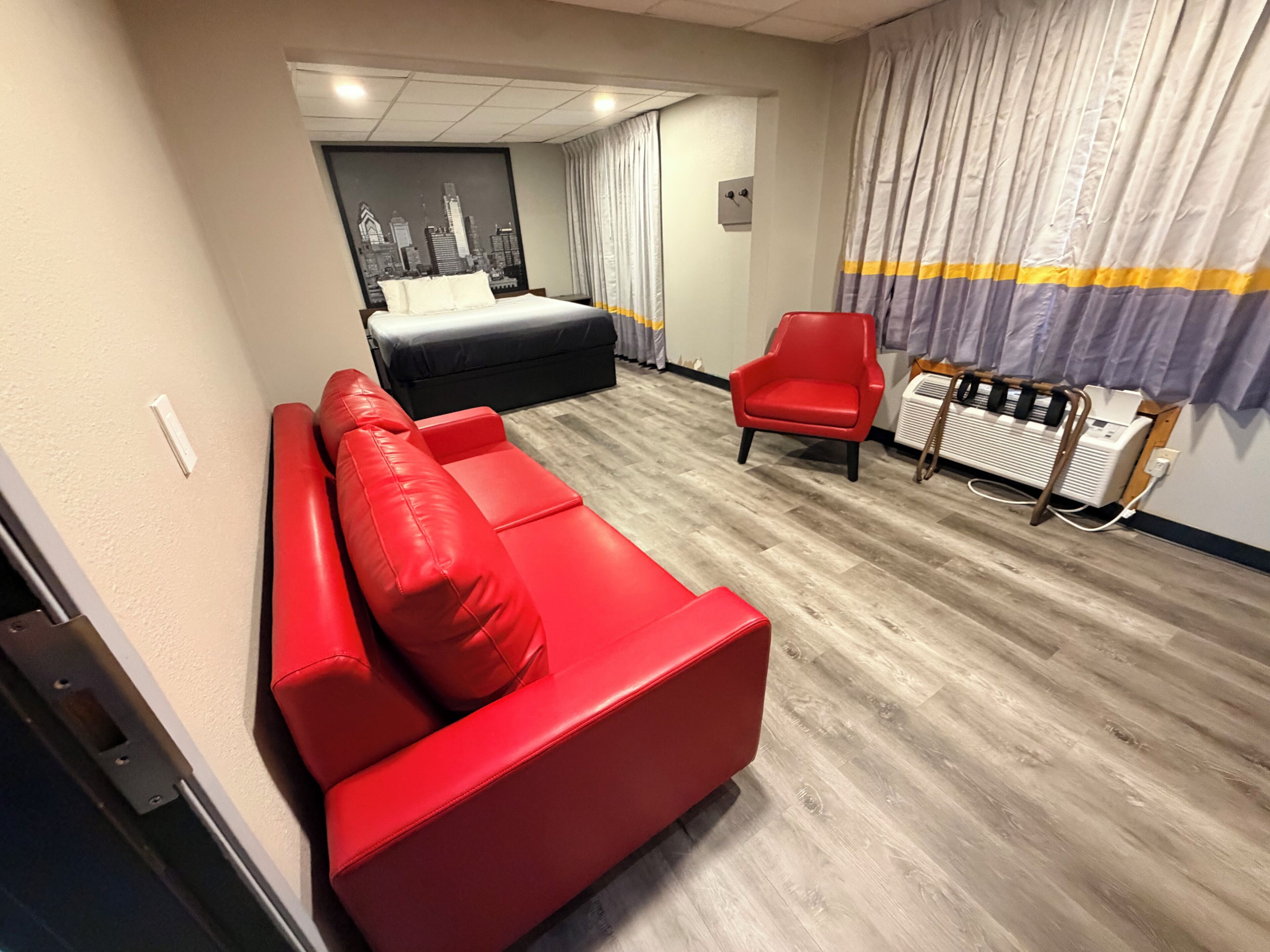 Suite, 1 King Bed with Sofa bed, Non Smoking | Desk, laptop workspace, blackout drapes, iron/ironing board