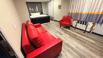 Suite, 1 King Bed with Sofa bed, Non Smoking | Desk, laptop workspace, blackout drapes, iron/ironing board