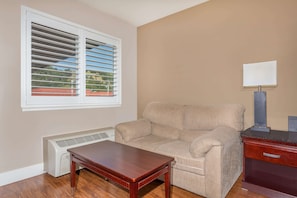 Desk, laptop workspace, iron/ironing board, cots/infant beds