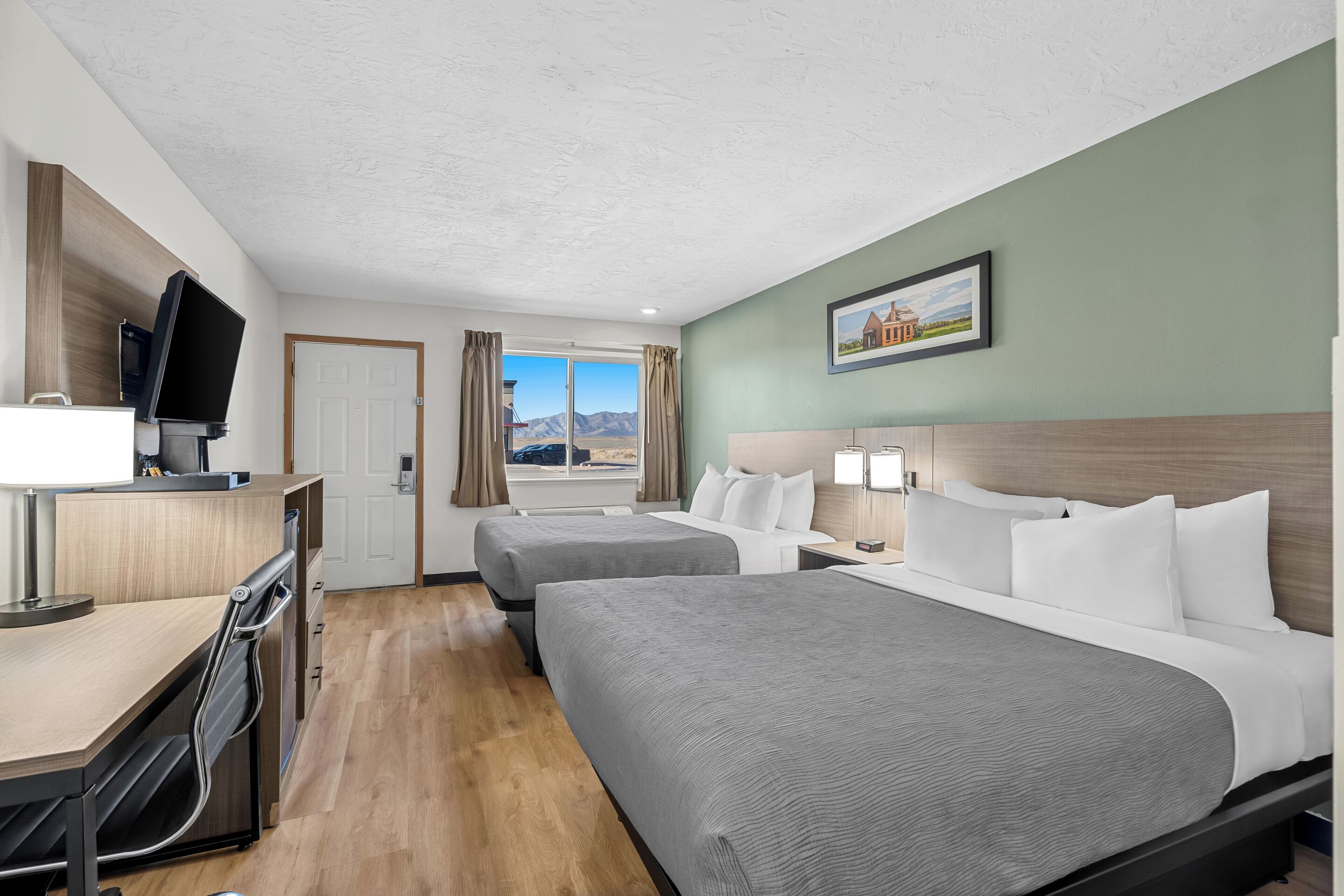 Standard Room, 2 Queen Beds, Non Smoking | Desk, blackout drapes, iron/ironing board, cribs/infant beds