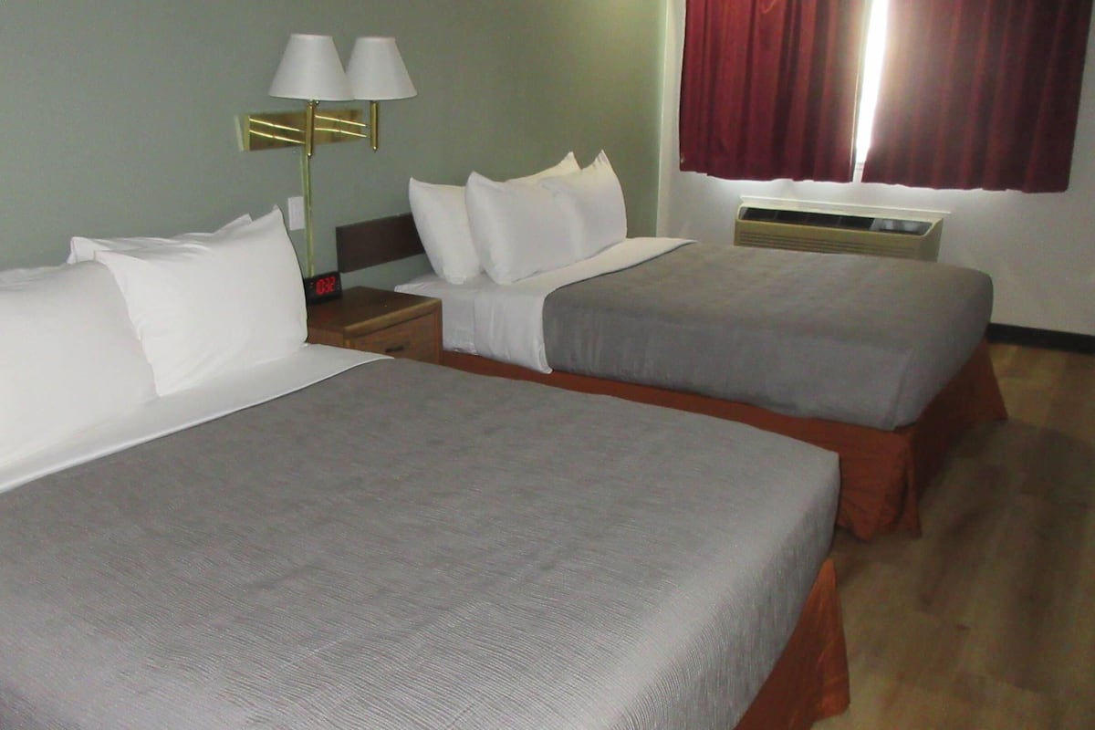 Standard Room, 2 Queen Beds, Non Smoking | 1 bedroom, desk, blackout drapes, iron/ironing board