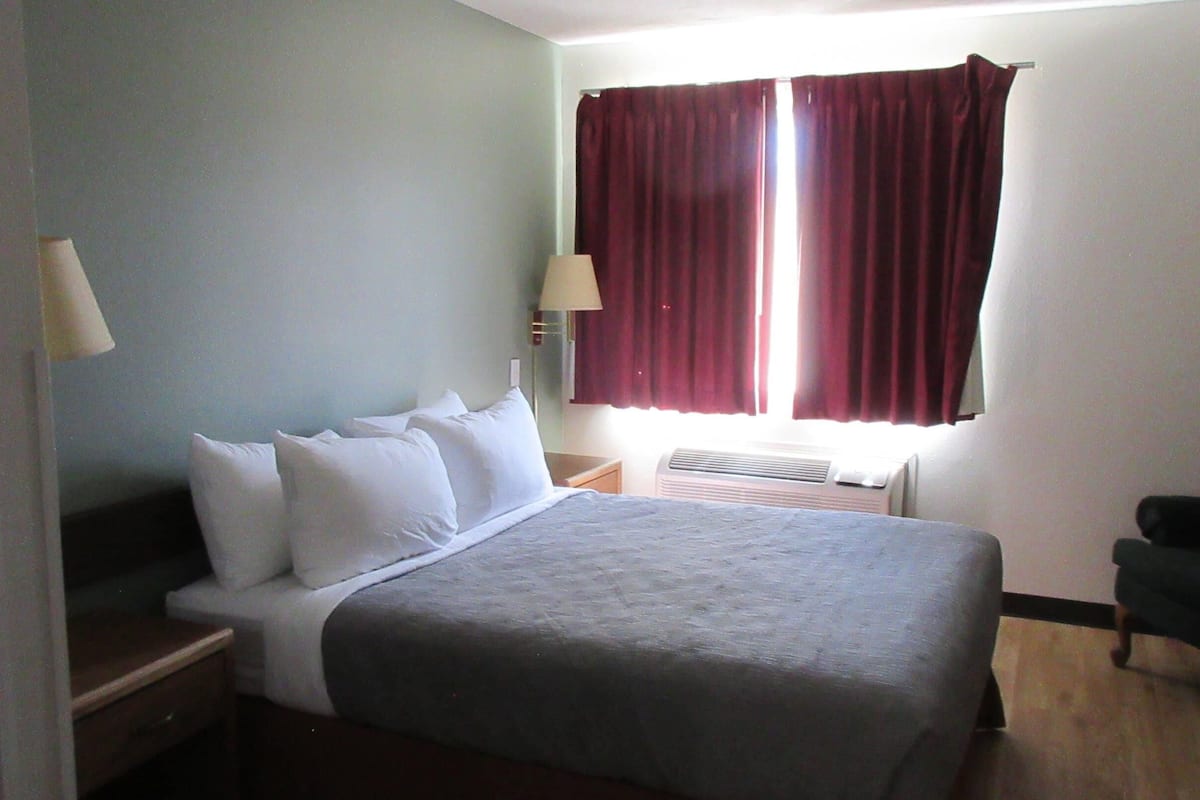 1 bedroom, desk, blackout drapes, iron/ironing board