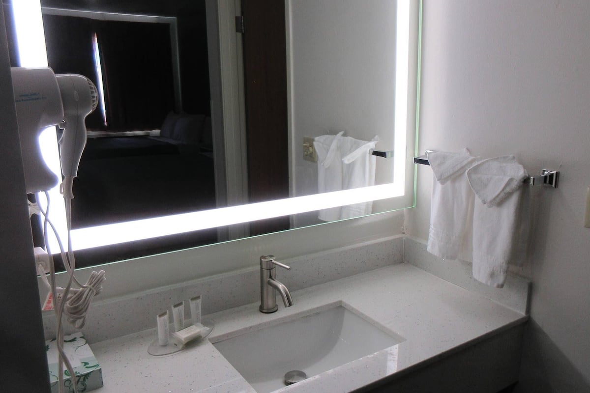 1 bedroom, desk, blackout drapes, iron/ironing board