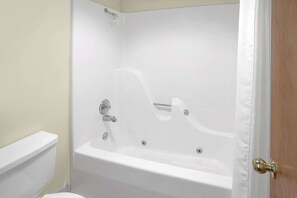Combined shower/bathtub, rainfall showerhead, free toiletries - Super 8 by Wyndham Clarksville AR (Clarksville)