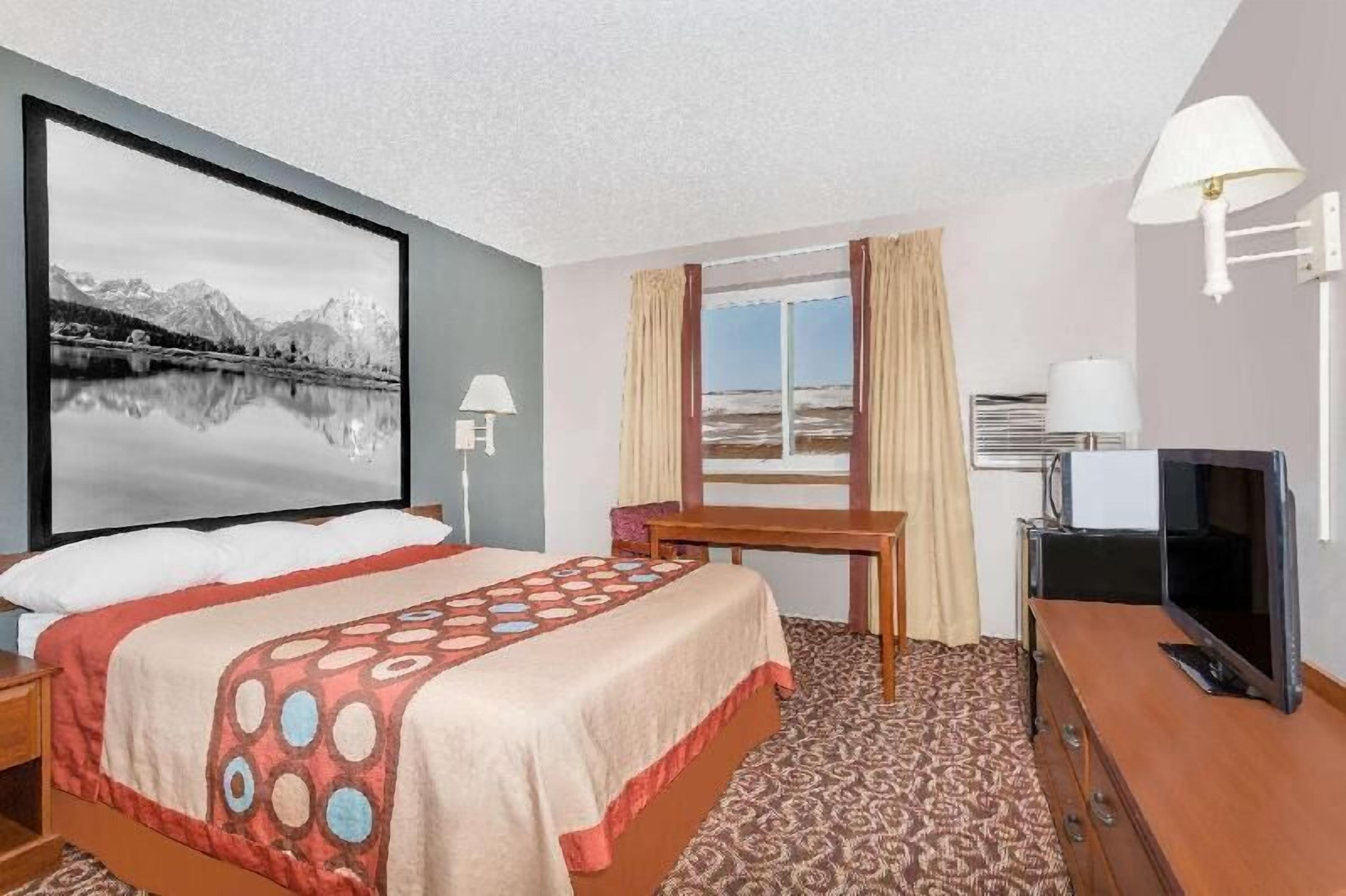 Coffre-fort, rideaux d’obscurcissement, fer et planche à repasser