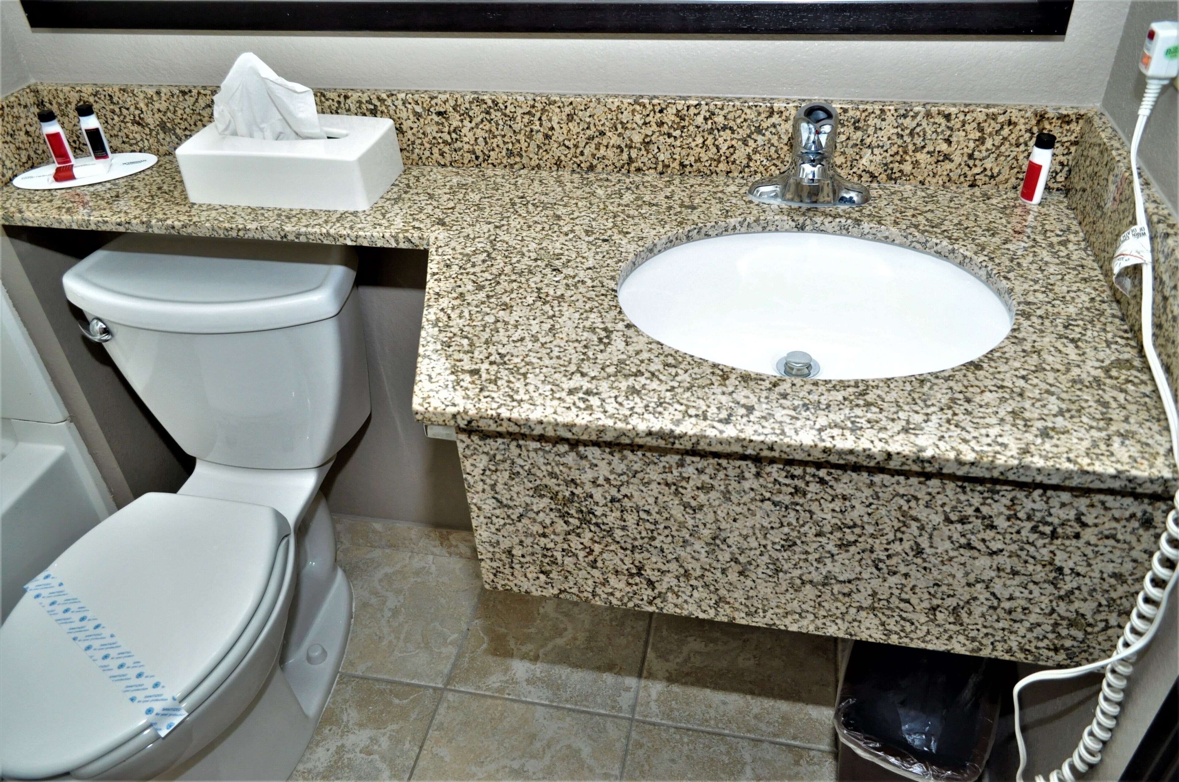 combined shower/bathtub, free toiletries, hair dryer, towels