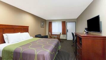 Premium bedding, desk, laptop workspace, blackout curtains