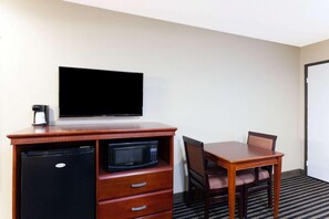 Premium bedding, desk, laptop workspace, blackout curtains