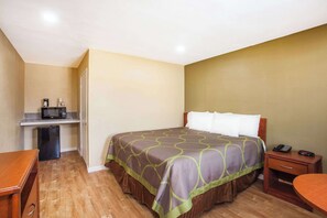 Standard Room, 1 King Bed | Desk, blackout drapes, free WiFi, bed sheets