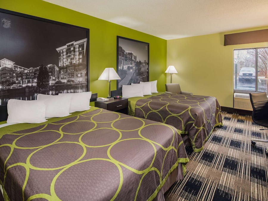 Desk, blackout drapes, iron/ironing board, free cribs/infant beds