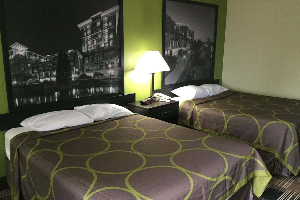 desk, blackout curtains, iron/ironing board, free cots/infant beds