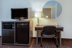 Tabla de planchar con plancha, wifi gratis y ropa de cama 