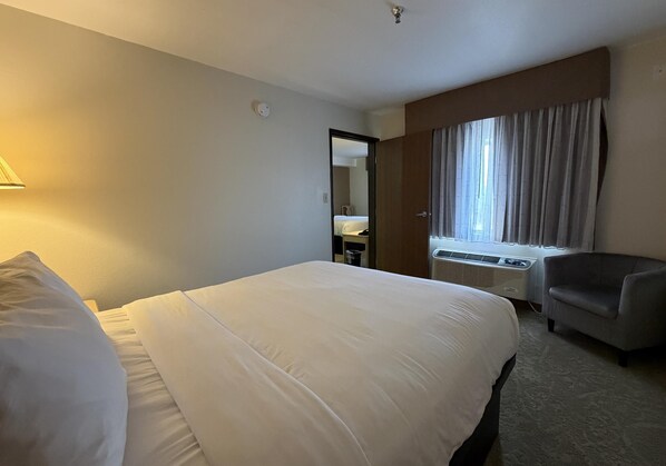 Family Room, Multiple Beds, Non Smoking | Individually furnished, desk, laptop workspace, iron/ironing board