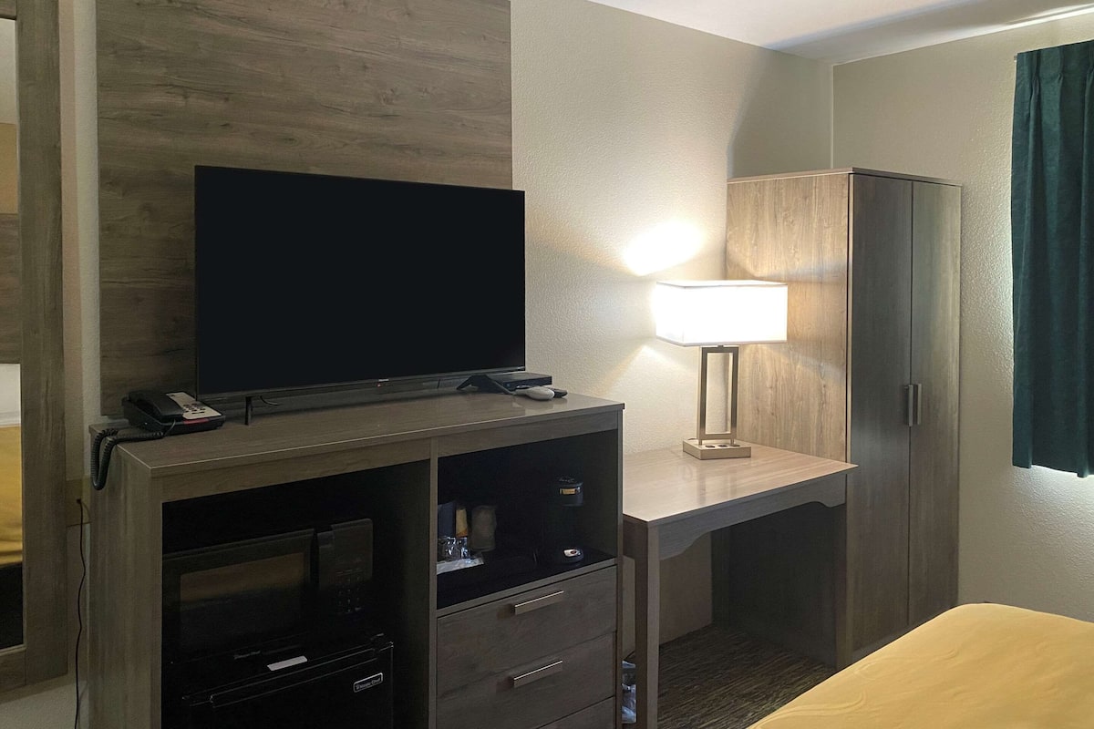 Individually furnished, desk, laptop workspace, iron/ironing board