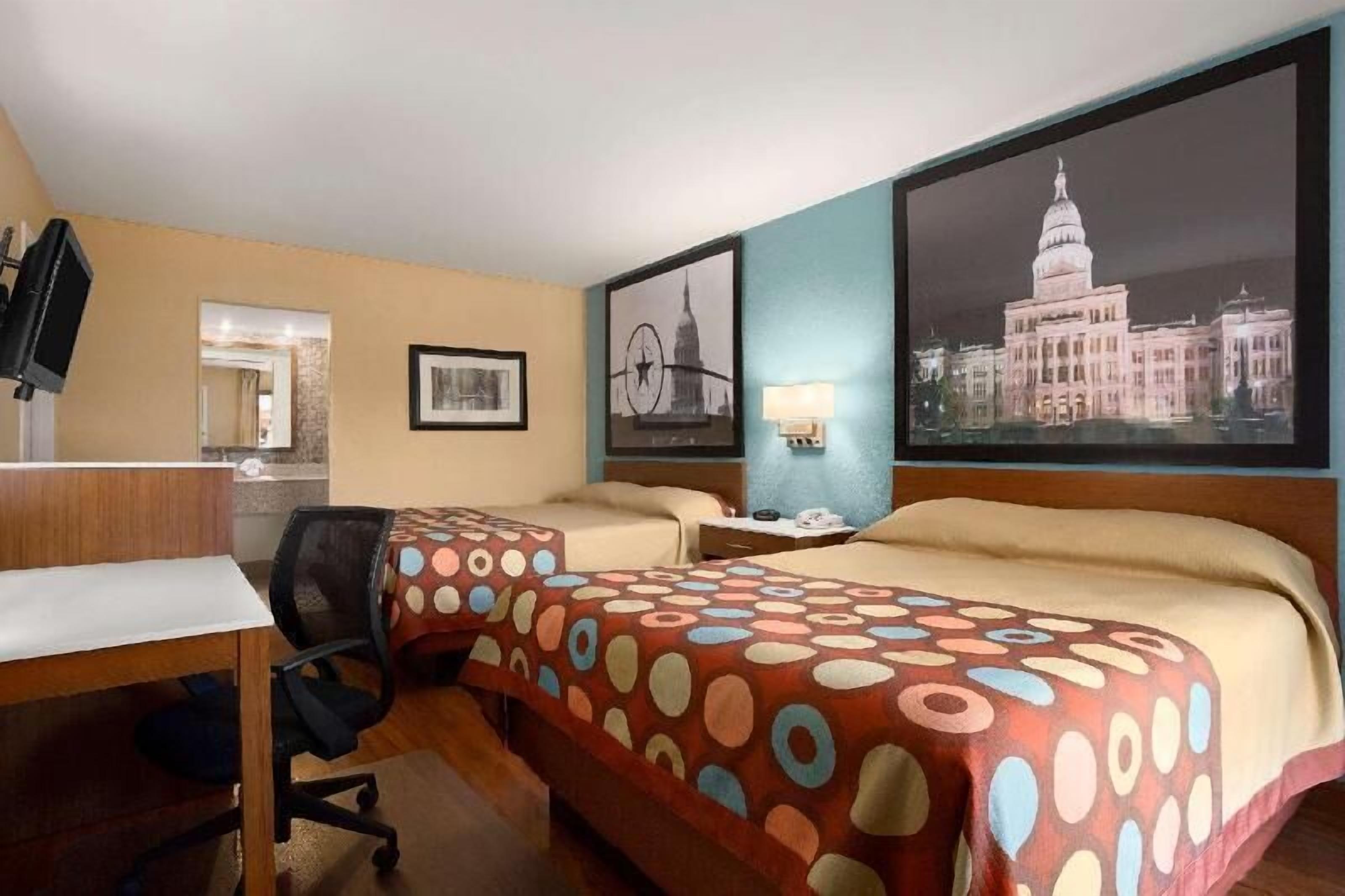 Desk, laptop workspace, blackout curtains, iron/ironing board