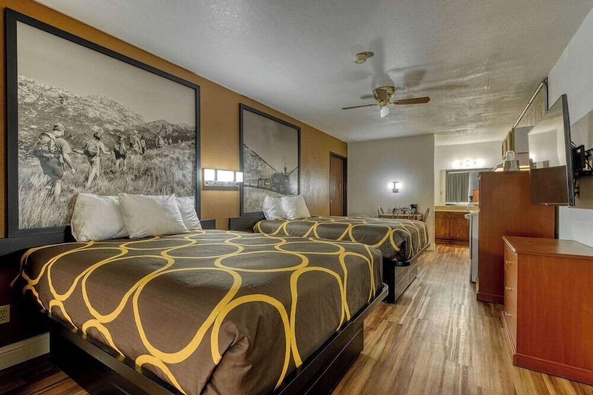 Premium bedding, desk, blackout drapes, iron/ironing board