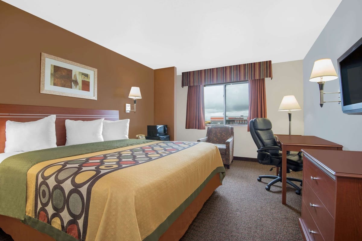 Premium bedding, desk, blackout drapes, iron/ironing board