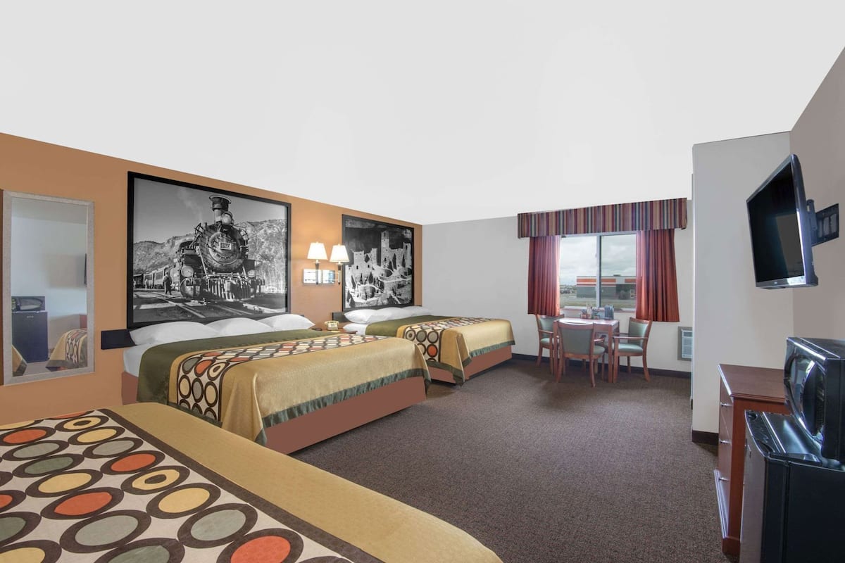 Premium bedding, desk, blackout drapes, iron/ironing board