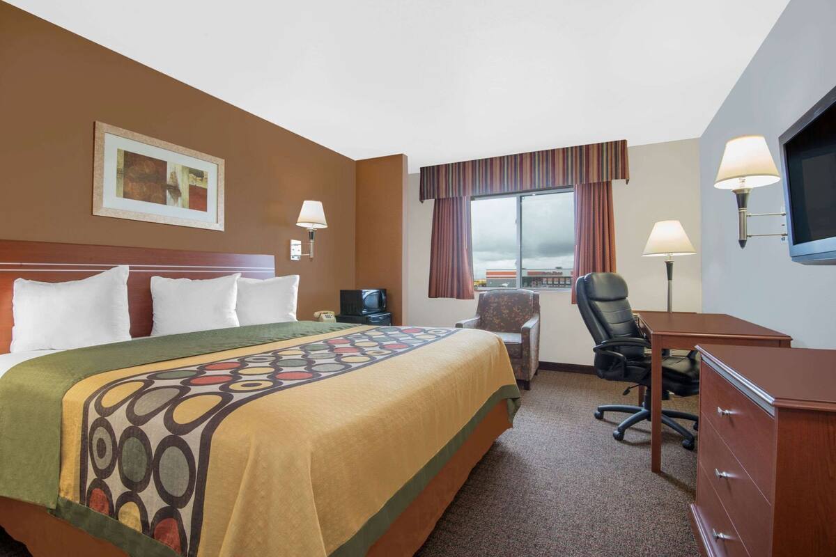 Premium bedding, desk, blackout drapes, iron/ironing board