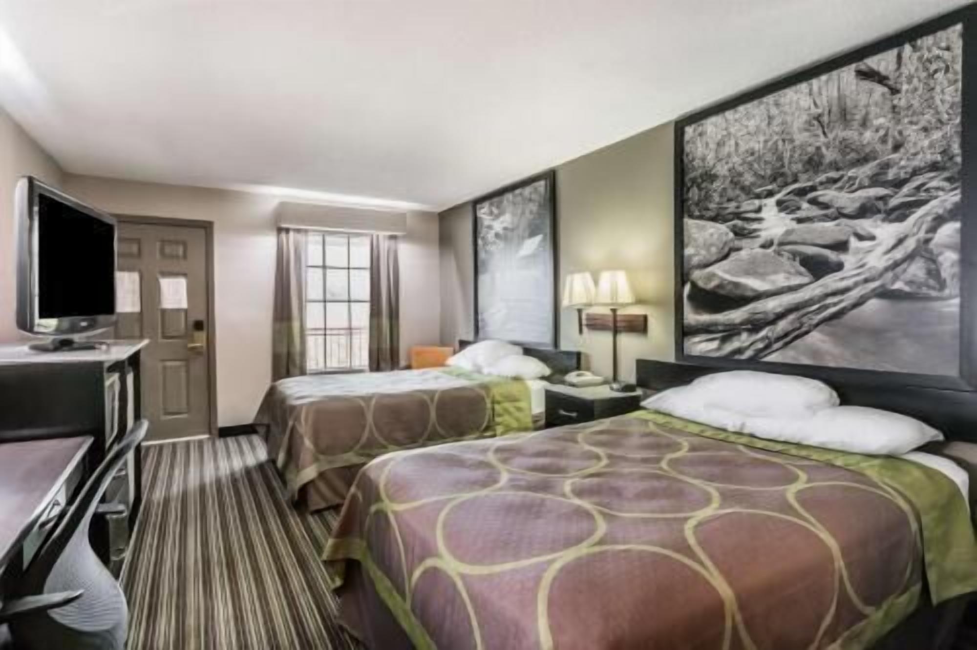 Desk, iron/ironing board, free cribs/infant beds, rollaway beds