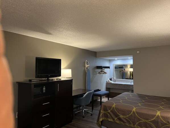 Room, 1 King Bed, Non Smoking (Pet-Friendly) | Desk, blackout drapes, iron/ironing board, free cribs/infant beds