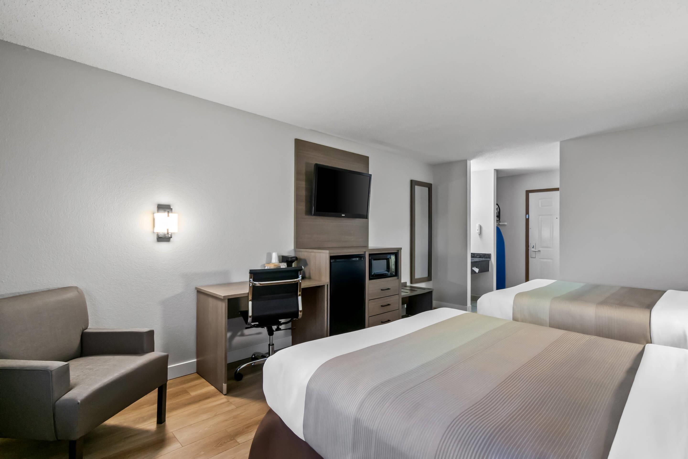 Habitación estándar, 2 camas de matrimonio, no fumadores | Ropa de cama de alta calidad y colchones con acolchado adicional