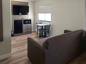 Suite, 1 King Bed, Non Smoking | Premium bedding, pillowtop beds, in-room safe, individually decorated