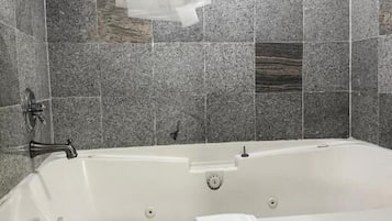 Standard Room, 1 King Bed, Jetted Tub | Minibar, desk, iron/ironing board, free WiFi