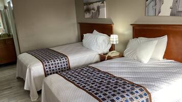 Standard Room, Multiple Beds | 1 bedroom, desk, laptop workspace, iron/ironing board