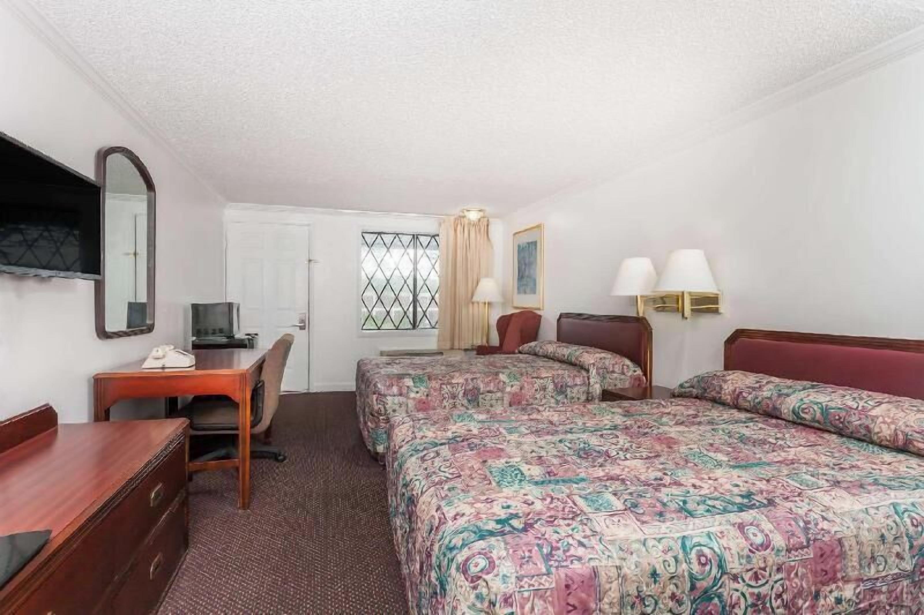 Desk, blackout drapes, free WiFi, bed sheets