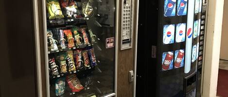A vending machine with snacks and a Pepsi dispenser.