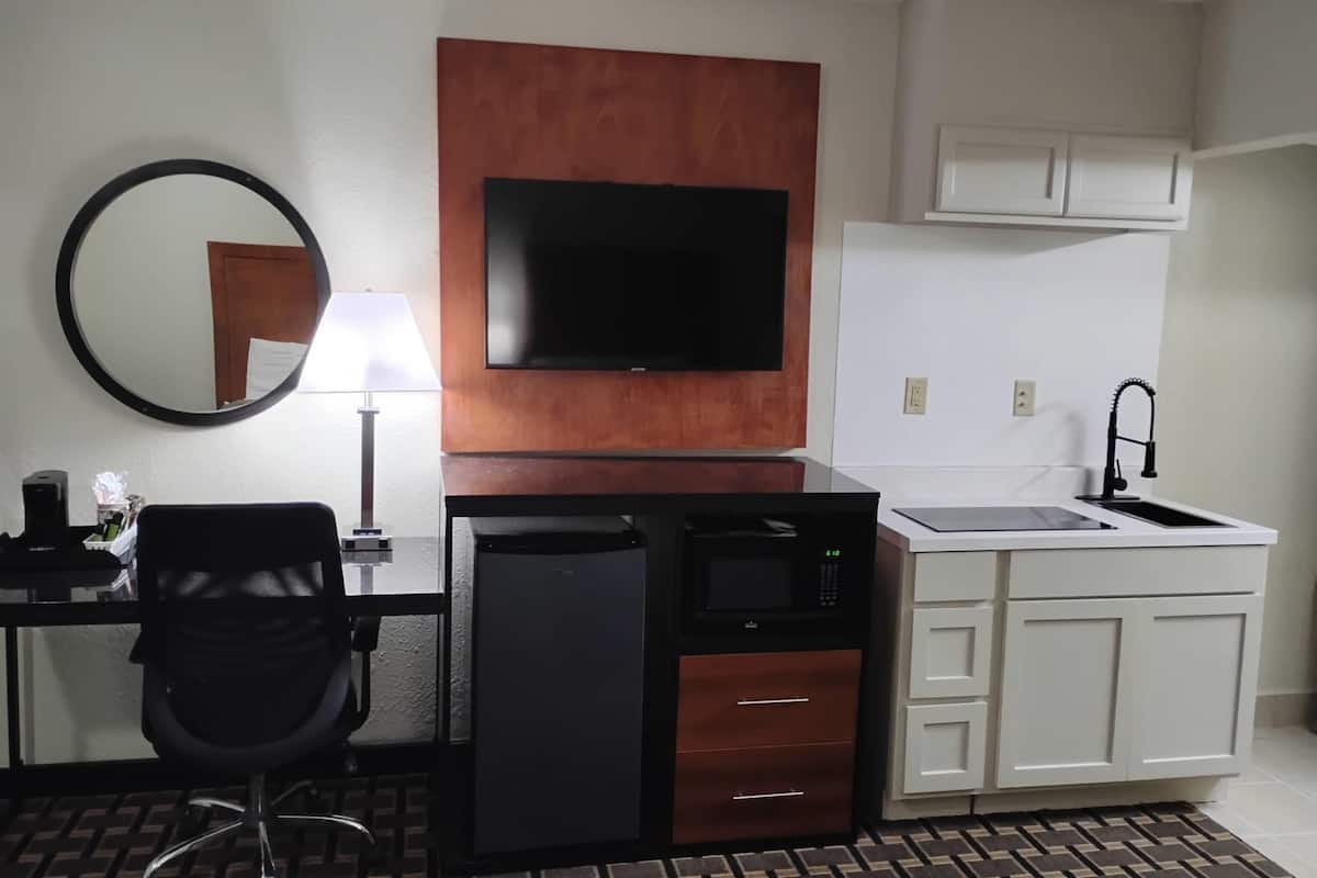 Desk, blackout curtains, soundproofing, iron/ironing board