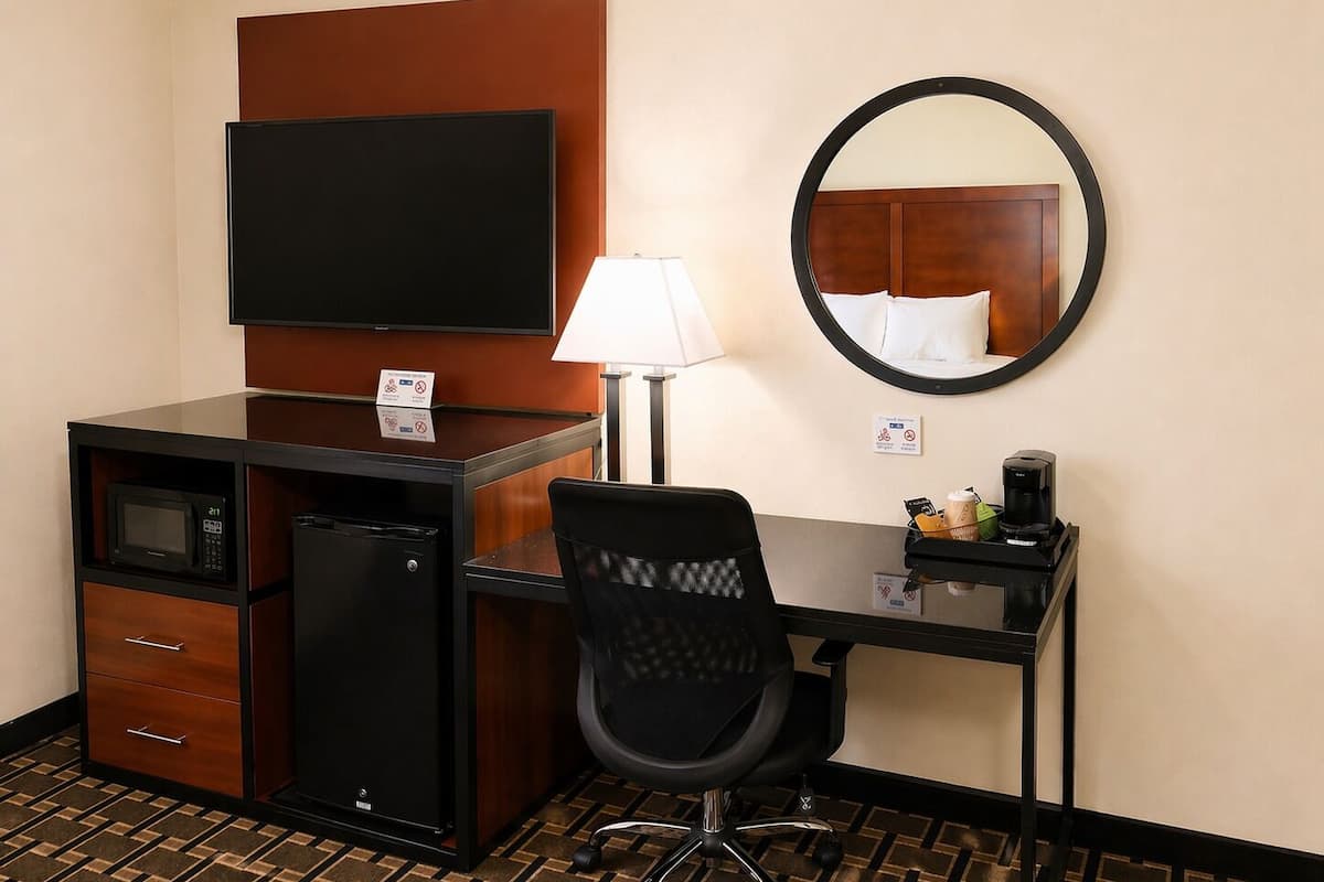 Desk, blackout drapes, soundproofing, iron/ironing board