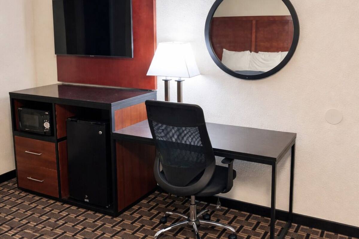 Desk, blackout curtains, soundproofing, iron/ironing board