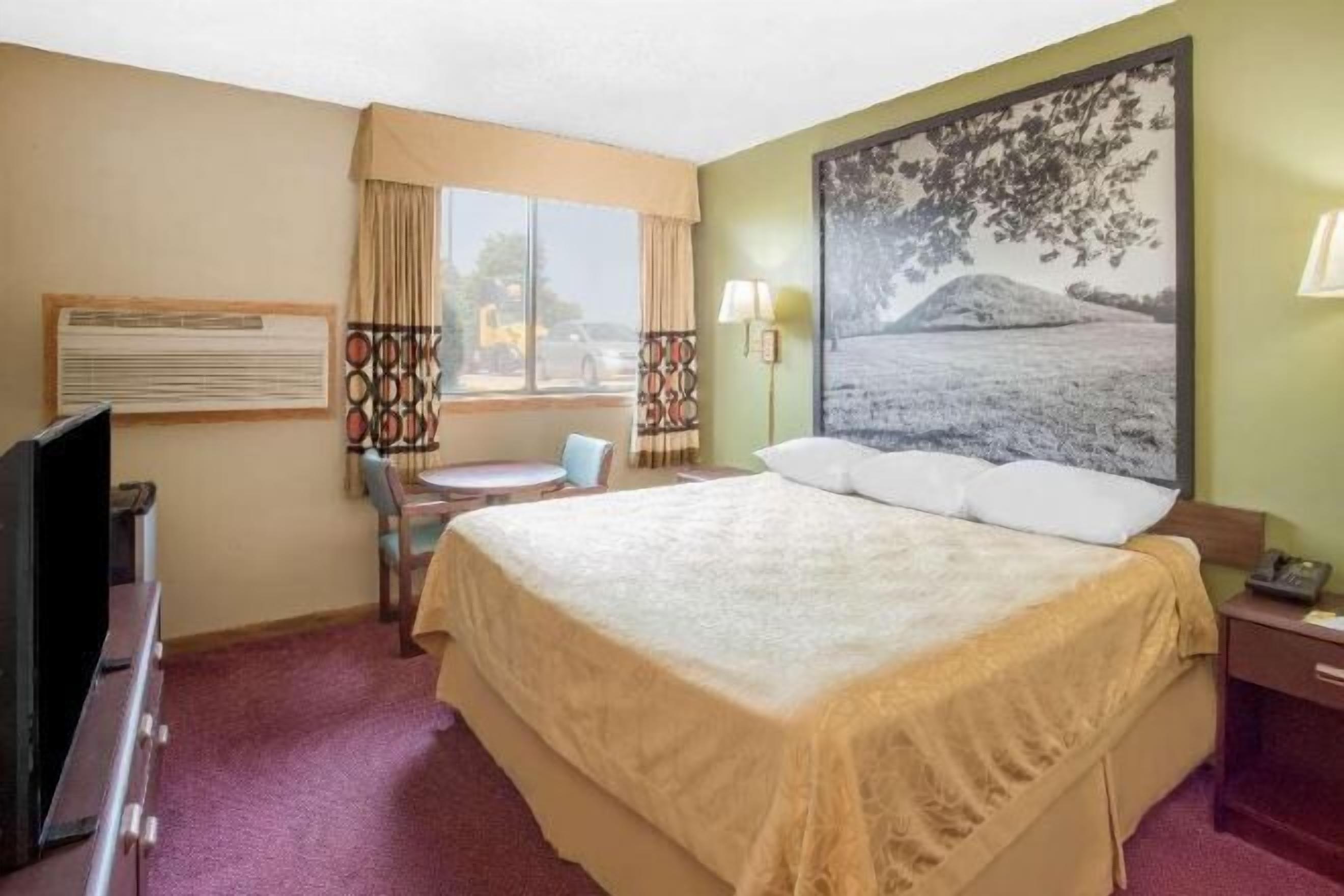 Desk, laptop workspace, blackout curtains, iron/ironing board