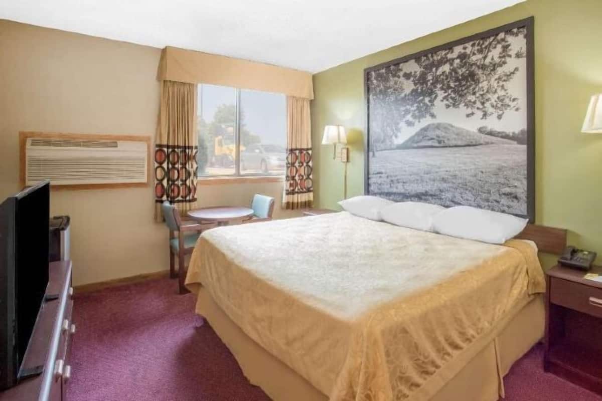 Desk, laptop workspace, blackout curtains, iron/ironing board